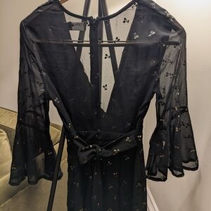 Elegant Black Dress with Sheer Sleeves